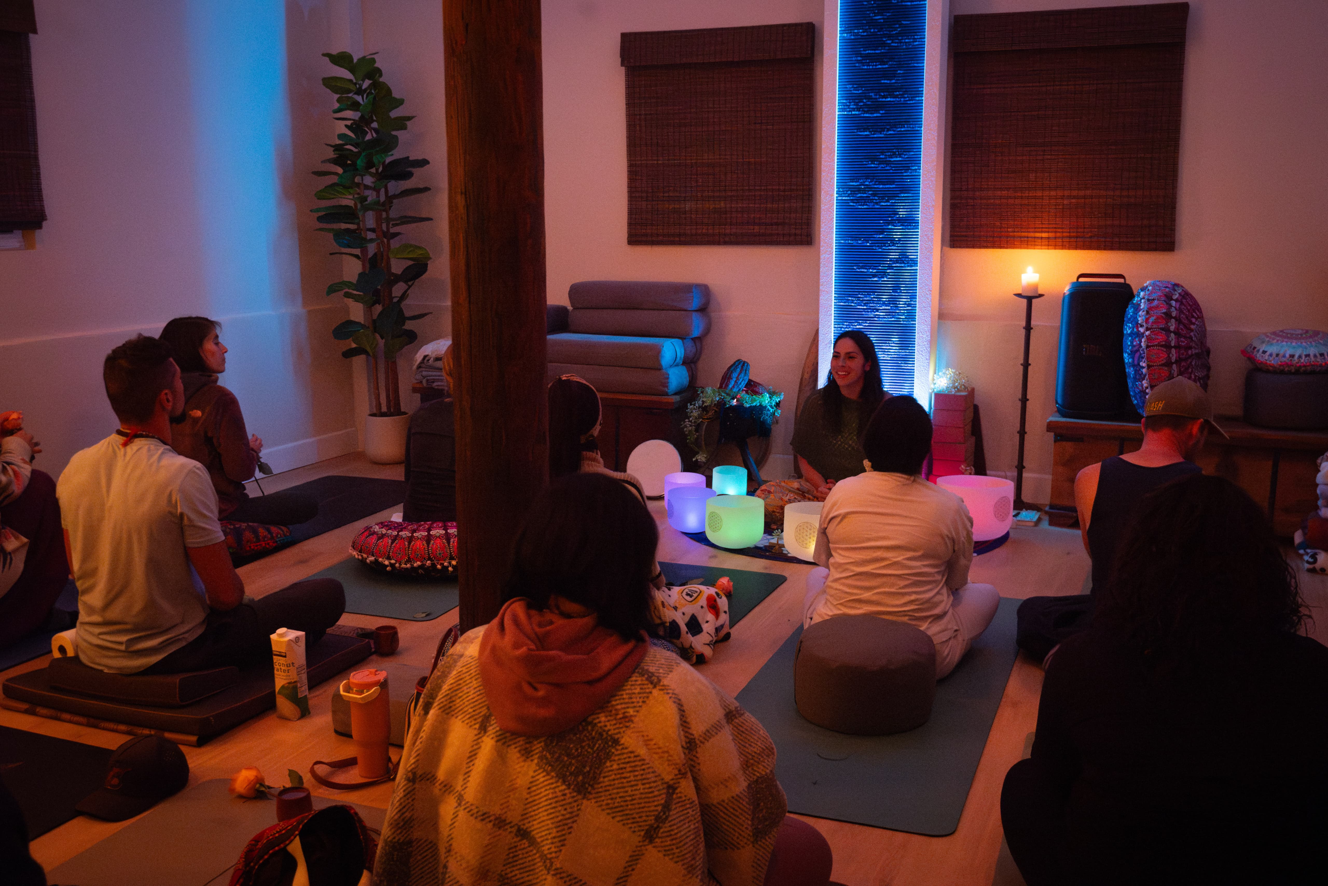 A coach leading a session in the meditation room